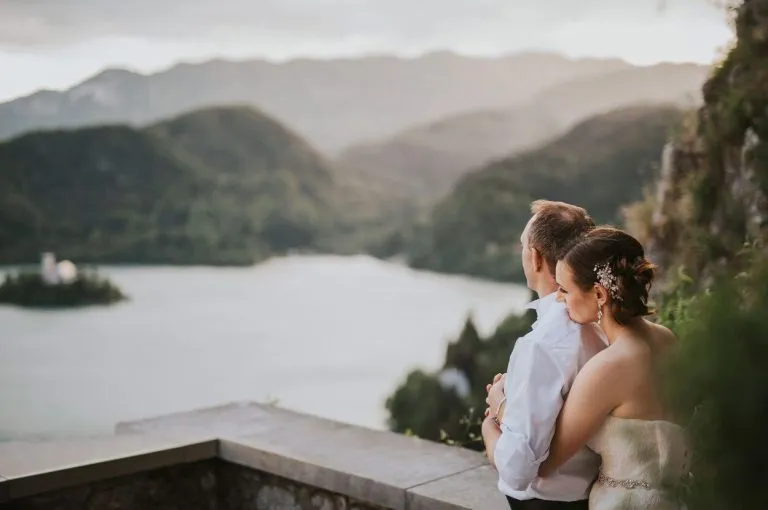 A married couple by the wall