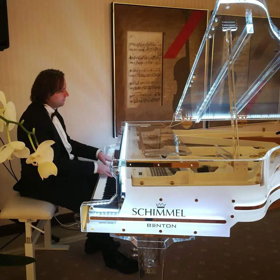 Marko playing piano on wedding